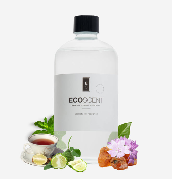 ecoscent-shop Darjeeling Tea Fragrance Oil featuring green tea, bergamot, and amber notes, presented in a clear bottle with a black cap, accompanied by visuals of a teacup, lime slices, and amber resin pieces.