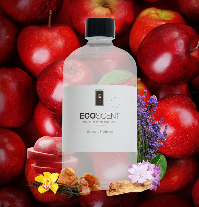 ecoscent-shop Apple Zest Fragrance Oil in a clear bottle with a black cap, featuring a blend of apple, floral, and vanilla scents. The bottle label reads "ECO SCENT" and is set against a backdrop of red apples and floral elements.