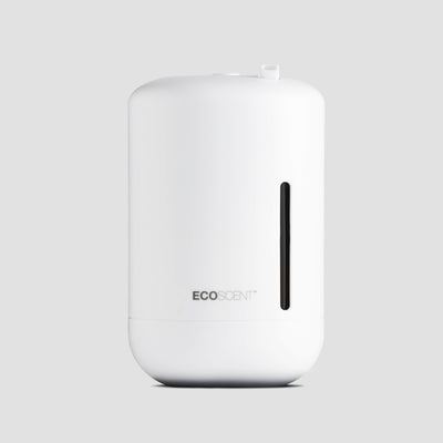 EcoScent Ariel wall-mounted scent machine in white, designed for small commercial spaces and bathrooms up to 100m³, featuring a sleek cylindrical body and a visible fragrance output window.