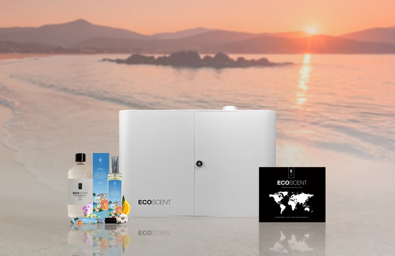 Ecoscent products on a beach with a sunset in the background