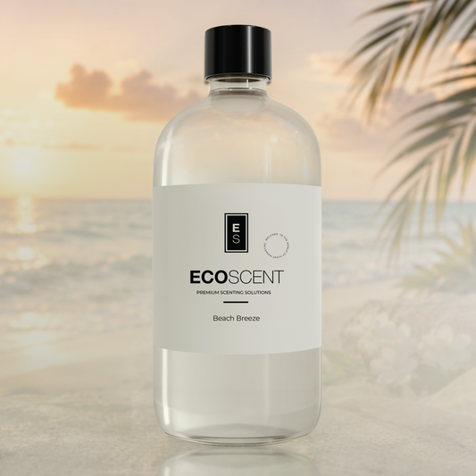 Bottle of Ecoscent Beach Breeze fragrance with a sunset and palm leaves in the background