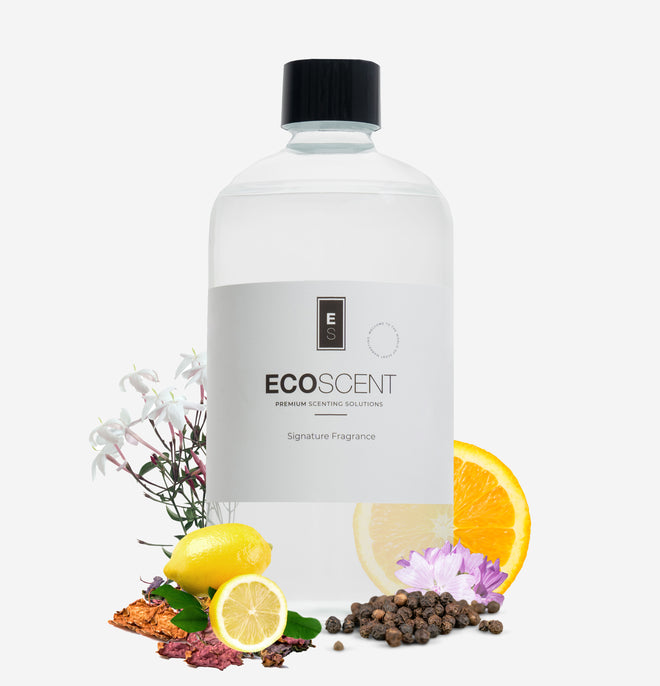 ecoscent-shop Black Pepper Fragrance Oil in a clear bottle with a black cap, accompanied by botanical ingredients including lemon and various flowers, highlighting the fragrance's natural elements.