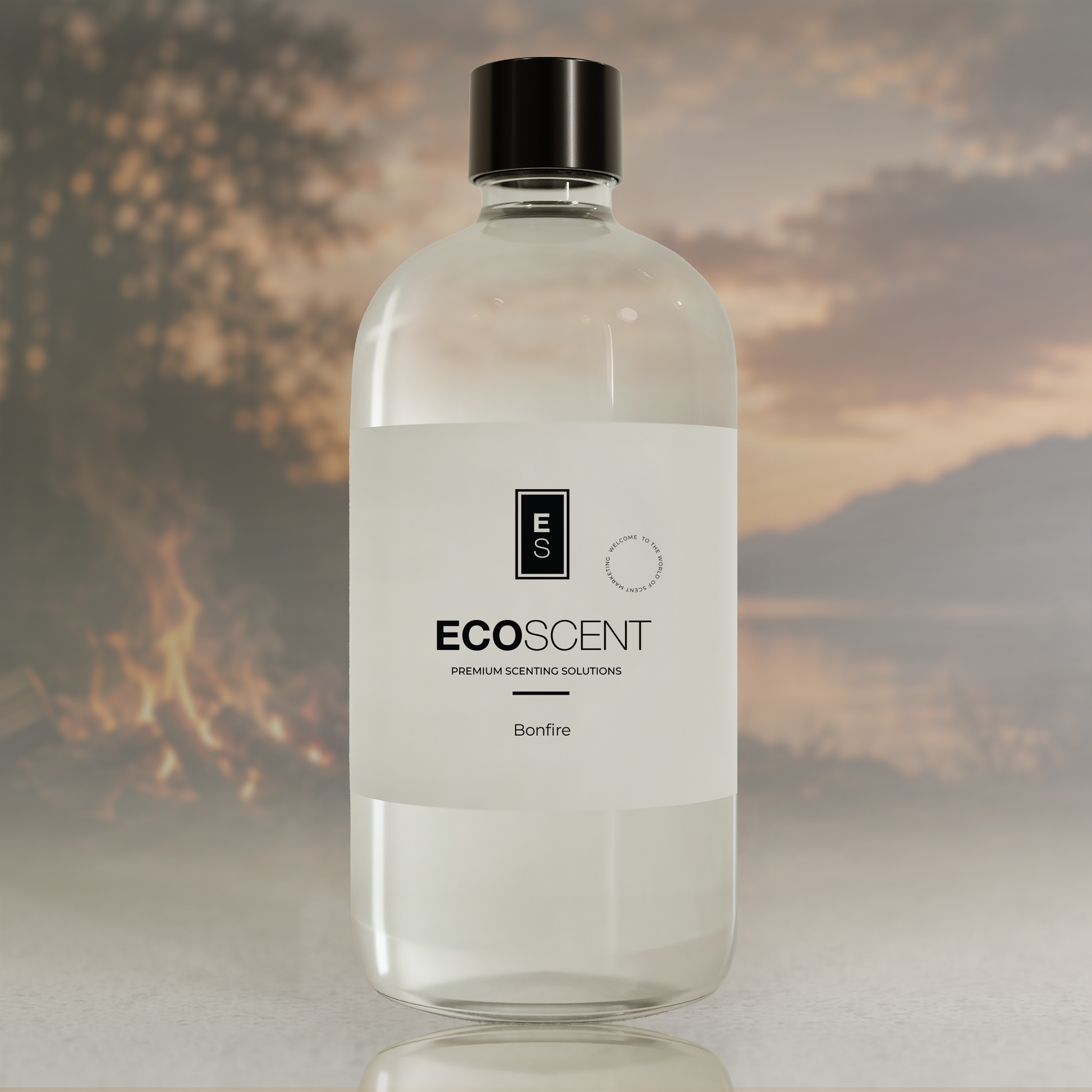 A clear glass bottle of EcoScent Bonfire premium scenting solutions with a white label and black cap, set against a blurred background of a campfire and mountains.
