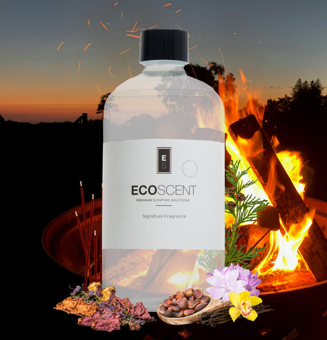 ecoscent-shop Campfire Comfort Fragrance Oil in Cedarwood, Smoke, Vanilla, presented in a clear bottle with a black cap, featuring a label that reads ‘ECOSCENT Premium Scientific Solutions’ amid a campfire setting.