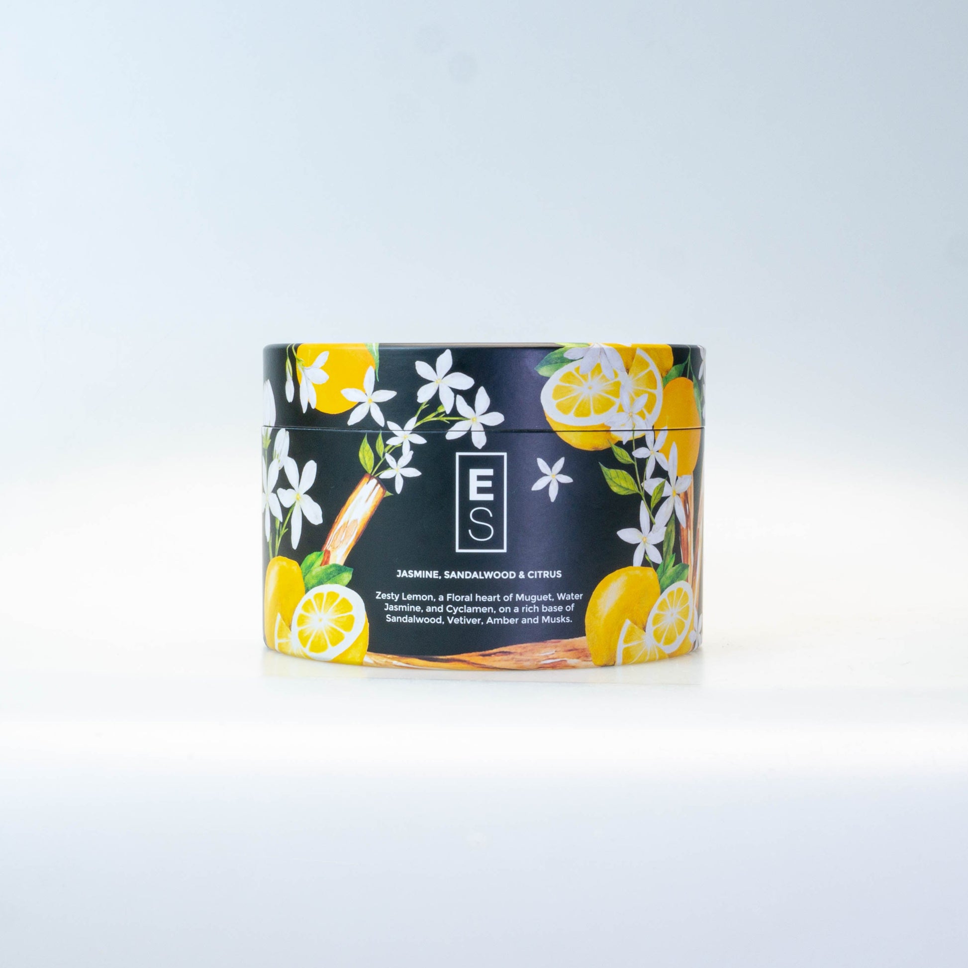 candle container with floral design on a white background