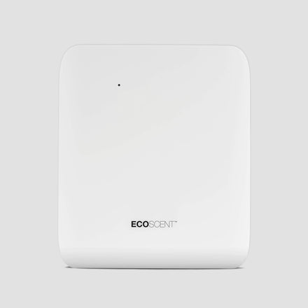 EcoScent Deimos Pro HVAC Commercial Scent Machine in white, designed for spaces up to 2,000m³. The machine features a sleek, minimalist design with the ECO SCENT logo prominently displayed.