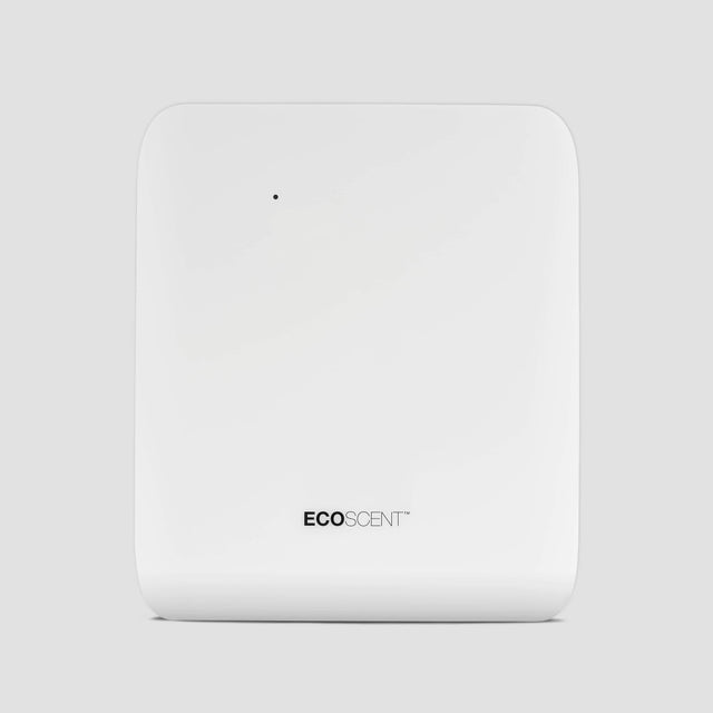 EcoScent Deimos Pro HVAC Commercial Scent Machine in white, designed for spaces up to 2,000m³. The machine features a sleek, minimalist design with the ECO SCENT logo prominently displayed.