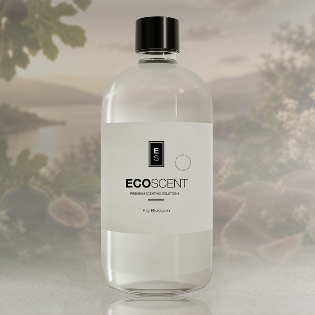 A clear bottle of EcoScent Fig Blossom premium scenting solutions with a white label and black cap, set against a soft-focus background of green leaves and water.