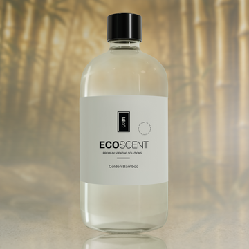 Bottle of Ecoscent Golden Bamboo product with a blurred bamboo background
