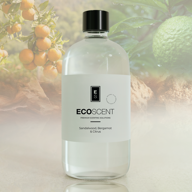 Bottle of Ecoscent product with a blurred natural background