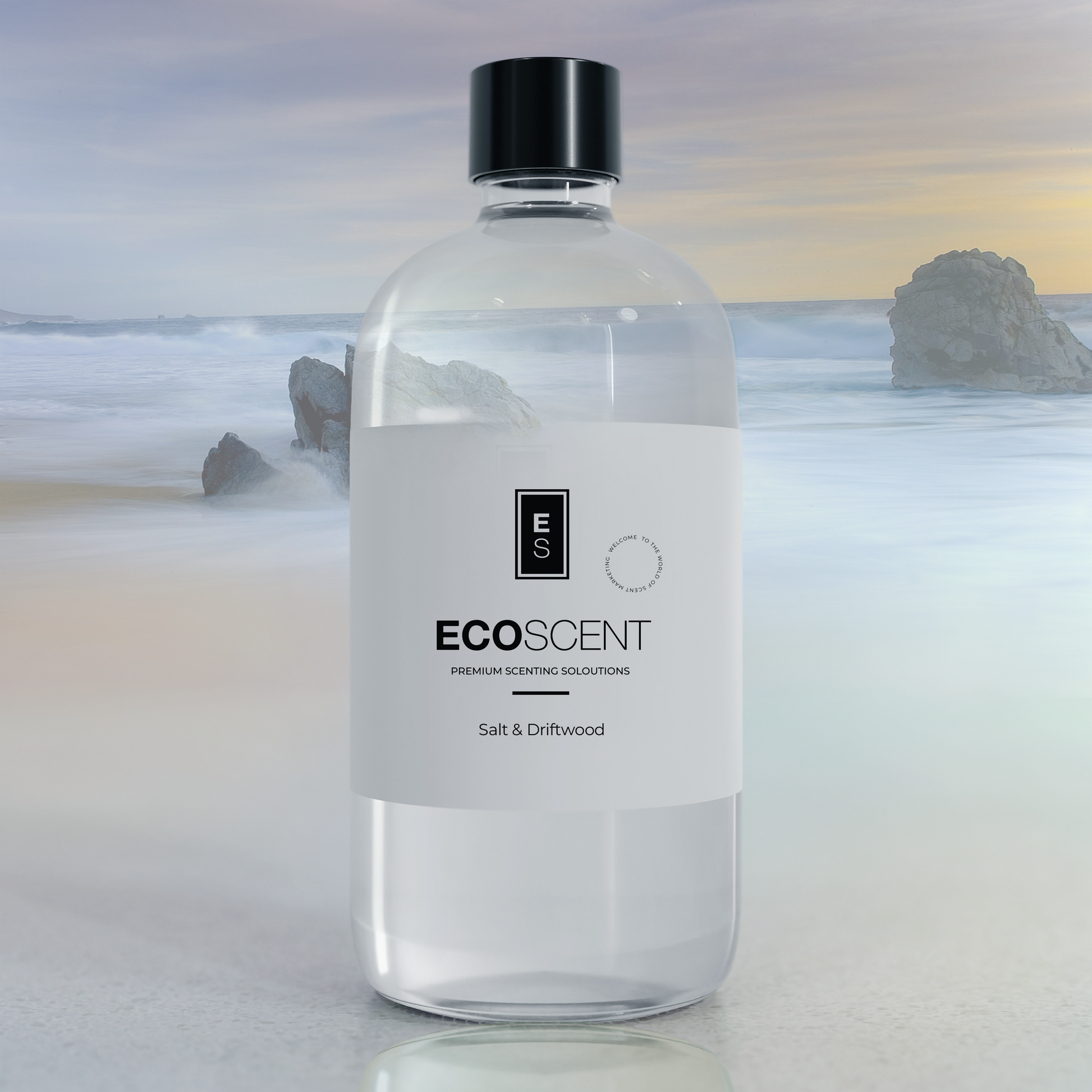 Clear bottle with black cap labeled 'EcoScent' on a beach background