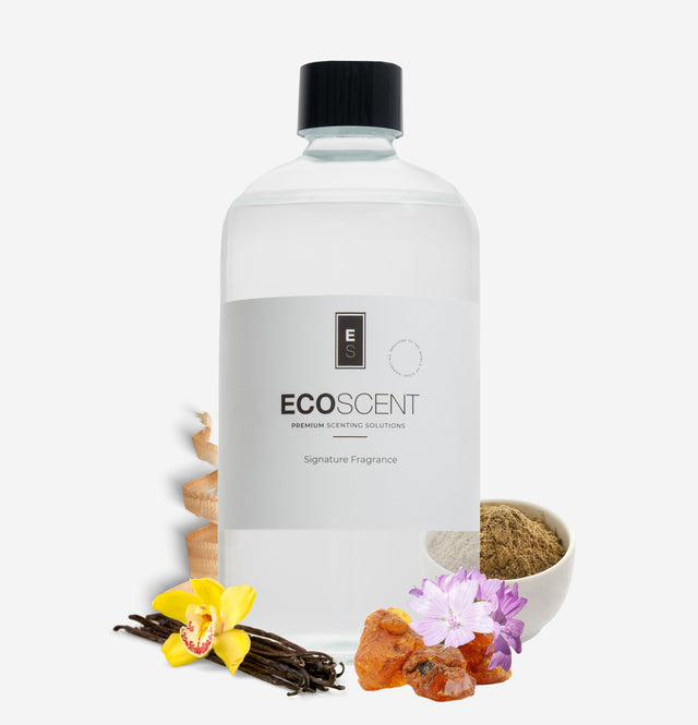 ecoscent-shop Sandalwood, Amber & Vanilla Fragrance Oil in a clear bottle with a black cap. Accompanied by orchid flowers, vanilla pods, and amber resin pieces, showcasing the natural ingredients of the fragrance.