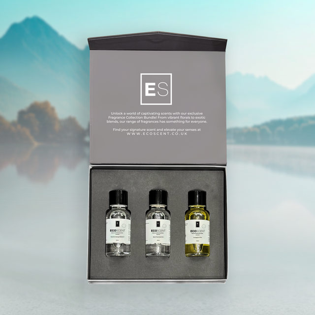 EcoScent fragrance collection bundle with three bottles in a box against a mountainous background