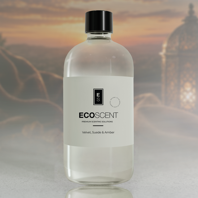 ecoscent-shop Velvet Suede & Amber Fragrance Oil in a clear bottle, featuring a black cap and a white label with text detailing the fragrance notes of leather, amber, and woods.