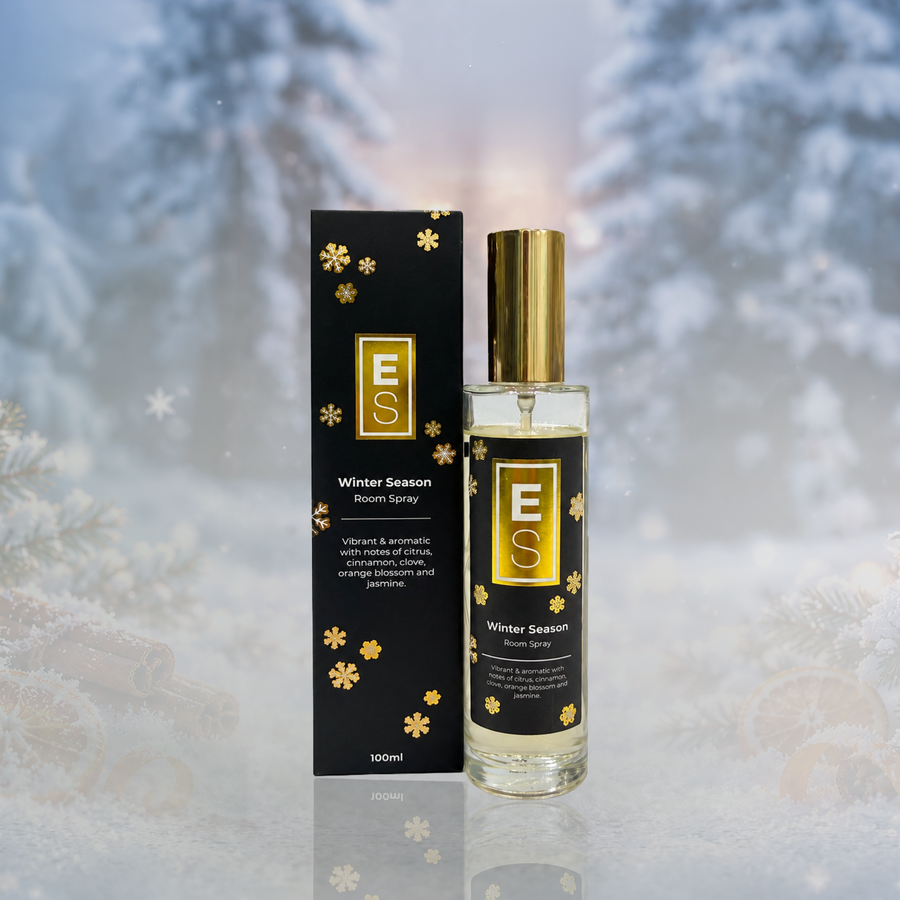 EcoScent Premium Scent Solutions Winter Season Long-Lasting Room Spray in 100ml size, presented in a sleek glass bottle with a gold cap, featuring a black box with floral designs and the brand logo.