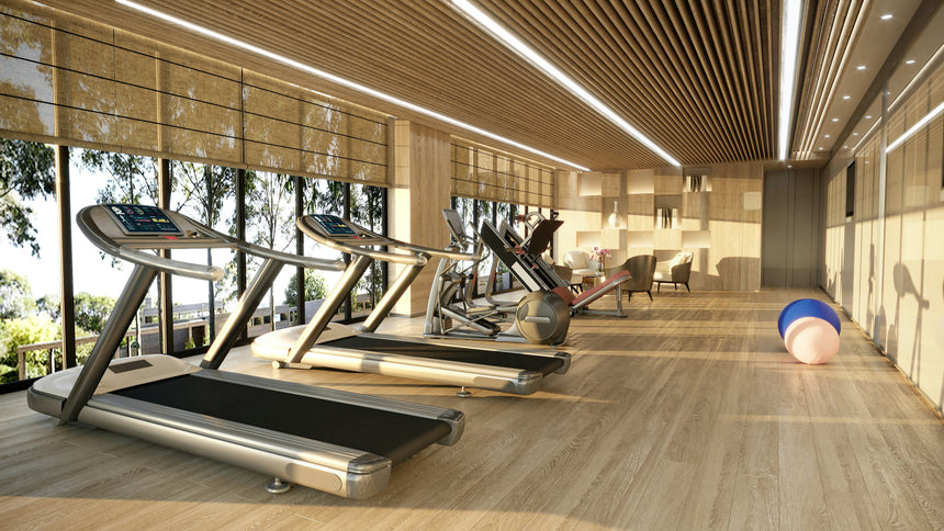 Premium fitness studio with treadmills and large windows