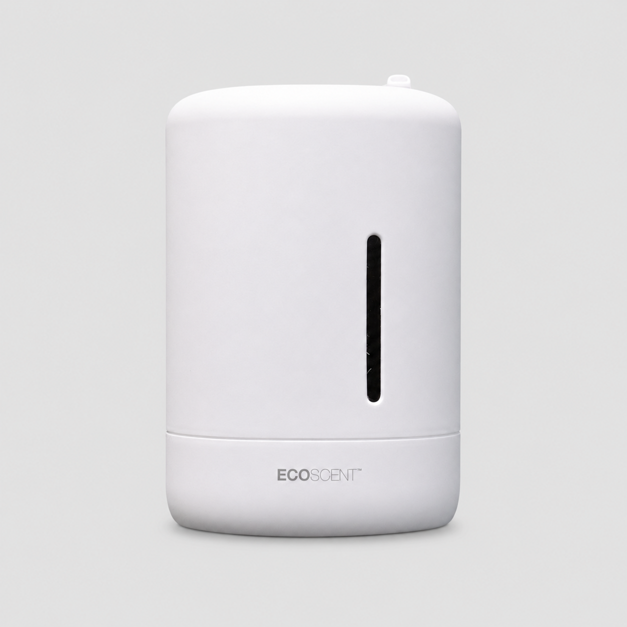 A white cylindrical EcoScent diffuser with a vertical black window on the front and the EcoScent brand name printed near the base, set against a solid light gray background.
