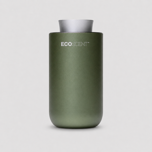 An EcoScent diffuser bottle in matte sage green with a silver metallic top cap, centered on a light gray background.